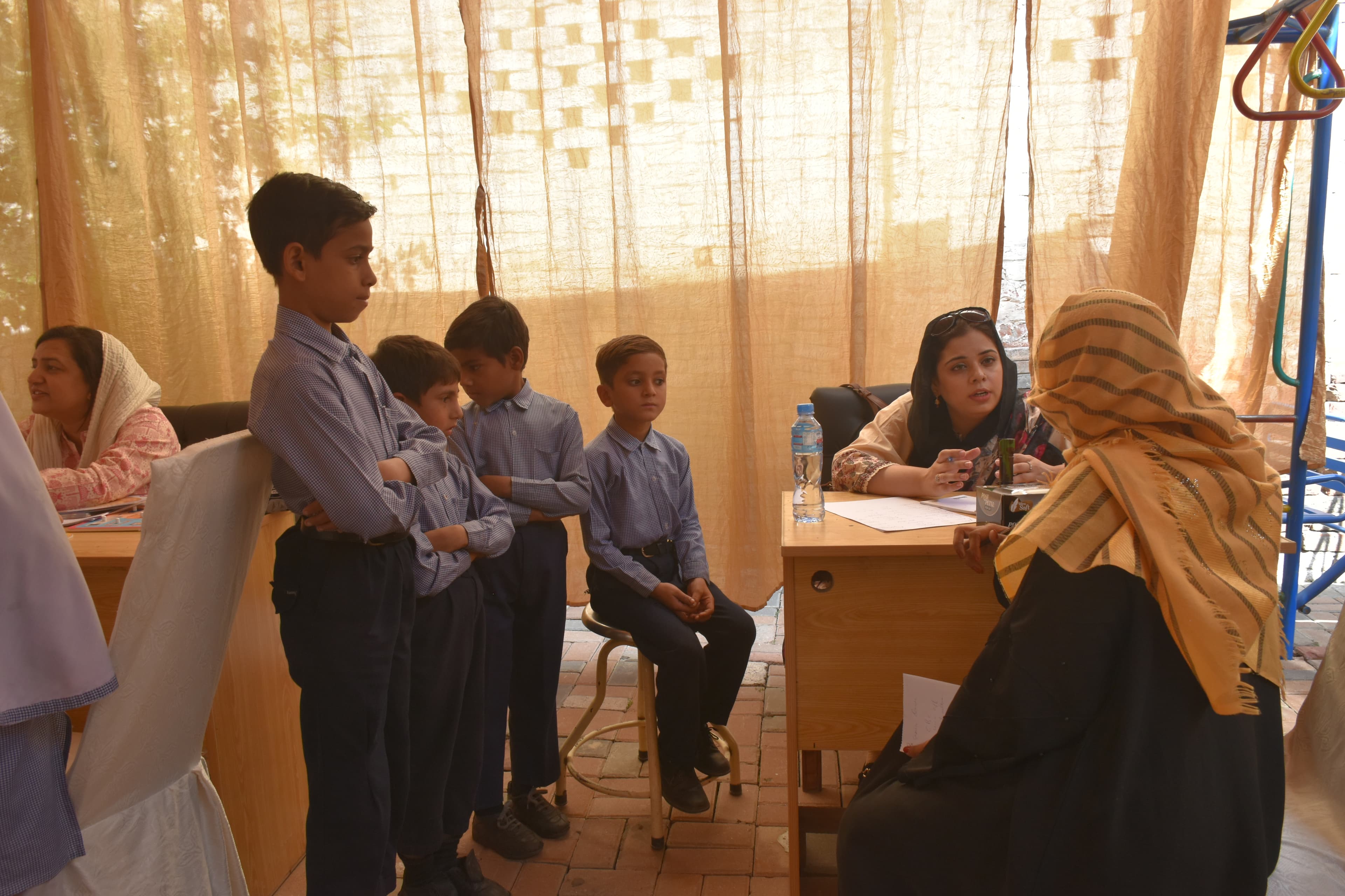 Students and learning spaces at a Helpline-supported school in Pakistan